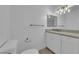 Bathroom featuring a toilet and vanity with granite countertop and modern light fixture at 6408 Shawnee Pl, Las Vegas, NV 89107