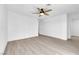 Bedroom with hardwood floors, a ceiling fan, and a closet with sliding doors at 6408 Shawnee Pl, Las Vegas, NV 89107
