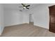 The living room features neutral walls and hardwood flooring, with a cabinet in the corner at 6408 Shawnee Pl, Las Vegas, NV 89107