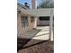 Exterior shot of covered backyard patio, showcasing an ideal outdoor entertaining space at 6561 Avon Ct, Las Vegas, NV 89108