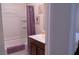 Bathroom featuring a tub, shower, vanity and modern decor at 6631 Frosted Harvest Ave, Las Vegas, NV 89108
