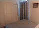 Cozy bedroom features sliding closet doors and soft natural light, creating a relaxing atmosphere at 6631 Frosted Harvest Ave, Las Vegas, NV 89108