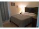 This bedroom features a stylish headboard, soft lighting, and elegant curtains at 6631 Frosted Harvest Ave, Las Vegas, NV 89108
