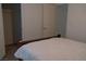Bedroom with cozy decor, featuring a comfortable bed and closet with a wire rack at 6631 Frosted Harvest Ave, Las Vegas, NV 89108