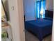 Cozy bedroom featuring neutral paint, plush carpet, and a comfortable bed at 6631 Frosted Harvest Ave, Las Vegas, NV 89108