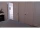 Neutral bedroom view showcasing closet space and adjacent room, all contributing to open feel at 6631 Frosted Harvest Ave, Las Vegas, NV 89108