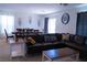 Bright living room with comfortable seating, dining area, and stylish decor at 6631 Frosted Harvest Ave, Las Vegas, NV 89108