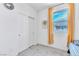 Bedroom with carpet, large window, and a closet at 694 Last Dance Pl, Henderson, NV 89011