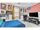 This bedroom has great natural light, neutral carpet, and lots of personality at 694 Last Dance Pl, Henderson, NV 89011