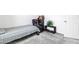 Bedroom featuring carpet, a bed, an armchair, and a display shelf at 694 Last Dance Pl, Henderson, NV 89011