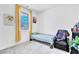 Bedroom featuring carpet, a bed, armchair, and natural light at 694 Last Dance Pl, Henderson, NV 89011