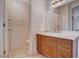 Bathroom with single sink, vanity, mirror and tile flooring at 7701 W Robindale Rd # 206, Las Vegas, NV 89113