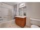 Bathroom with single sink, vanity, mirror and combination shower and bathtub at 7701 W Robindale Rd # 206, Las Vegas, NV 89113