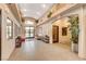 Spacious lobby with tile floors, plenty of seating, and natural light at 7701 W Robindale Rd # 206, Las Vegas, NV 89113