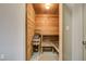 Relaxing sauna room, all wood, with wooden chairs and benches at 7701 W Robindale Rd # 206, Las Vegas, NV 89113