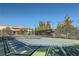 Well-maintained tennis court for active community residents at 7720 Fruit Dove St, North Las Vegas, NV 89084