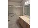 The bathroom features a shower and tub combination with a glass enclosure at 7900 Ryandale Cir # 201, Las Vegas, NV 89145