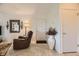 Cozy living room showcases neutral colors, comfortable seating, and a decorative vase at 7900 Ryandale Cir # 201, Las Vegas, NV 89145