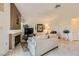 Cozy living room featuring fireplace, comfortable seating, and a decorative vase at 7900 Ryandale Cir # 201, Las Vegas, NV 89145