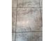 Close-up of the clean, neutral-toned tile flooring with dark grout lines throughout the condo at 7900 Ryandale Cir # 201, Las Vegas, NV 89145