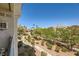 A scenic view of landscaped walkways, mature trees, and manicured shrubs enhance the outdoor appeal at 7900 Ryandale Cir # 201, Las Vegas, NV 89145
