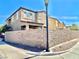 House backyard featuring a large, well-maintained concrete block wall at 81 Sertata Ct, Henderson, NV 89074