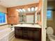 Bathroom features double sinks, a shower and bathtub combo, and a separate toilet at 81 Sertata Ct, Henderson, NV 89074