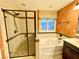Bright bathroom with a separate shower and bathtub beneath a window at 81 Sertata Ct, Henderson, NV 89074