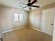Bedroom with a ceiling fan, window with shade, and closet at 81 Sertata Ct, Henderson, NV 89074