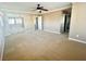 Spacious bedroom boasts a large closet with mirrored doors, neutral paint, and carpet at 81 Sertata Ct, Henderson, NV 89074
