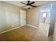 Bedroom with ceiling fan and an open door to the landing at 81 Sertata Ct, Henderson, NV 89074