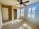 Bedroom with a ceiling fan, closet, and window with shutters at 81 Sertata Ct, Henderson, NV 89074