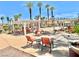 Seating at a community pool with pergola for shade in a luxurious desert community at 81 Sertata Ct, Henderson, NV 89074