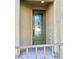 An inviting front door with decorative glass and stone steps leading up to it at 81 Sertata Ct, Henderson, NV 89074
