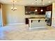 Beautiful kitchen showcasing stainless steel appliances, granite countertops, and a convenient island with a sink at 81 Sertata Ct, Henderson, NV 89074