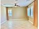 Bright living room with neutral walls, large windows, and stylish curtains, creating a welcoming atmosphere at 81 Sertata Ct, Henderson, NV 89074