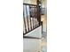 Interior shot of staircase featuring wood railing overlooking lower floor at 81 Sertata Ct, Henderson, NV 89074