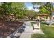 Community park showcasing shaded picnic areas and a walking path at 10617 Tuckermans Ave, Las Vegas, NV 89129