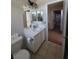 This bathroom has a white vanity and a toilet at 1144 Black Cherry St, Las Vegas, NV 89142