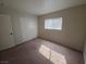 Cozy bedroom with neutral carpet and a closet at 1144 Black Cherry St, Las Vegas, NV 89142