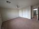 An airy bedroom features carpet and a ceiling fan at 1144 Black Cherry St, Las Vegas, NV 89142