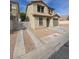 Two-story home featuring neutral stucco, a red tile roof, and a one-car garage at 1144 Black Cherry St, Las Vegas, NV 89142
