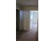Upstairs hallway leading to bedrooms, featuring neutral carpet flooring at 1144 Black Cherry St, Las Vegas, NV 89142
