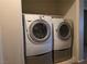 Convenient laundry area with modern washer and dryer units at 1144 Black Cherry St, Las Vegas, NV 89142
