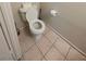 This bathroom shows a standard white toilet, with a tile floor and basic fixtures at 1144 Black Cherry St, Las Vegas, NV 89142