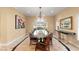 Formal dining room with chandelier and marble floors at 1234 Campbell Dr, Las Vegas, NV 89102