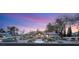 Exterior image features a single story home with desert landscaping illuminated at twilight at 1234 Campbell Dr, Las Vegas, NV 89102