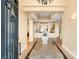 Grand foyer with tile flooring, high ceilings, and an open floor plan at 1234 Campbell Dr, Las Vegas, NV 89102