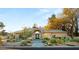 Charming home with desert landscaping, mature trees, and an inviting walkway at 1234 Campbell Dr, Las Vegas, NV 89102