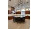 Spacious kitchen with island, breakfast bar, stainless steel appliances, and modern lighting at 1234 Campbell Dr, Las Vegas, NV 89102